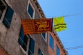 The flag of the Italian region of Veneto hanging to dry