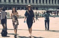 Young tourist girls visiting St. Mark s Square in Venice