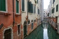 Venice, Italy - 14 Nov, 2022: Colourful backstreet canals of the Venetian Lagoon Royalty Free Stock Photo