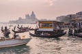 Venice, Italy - Nov 9 2019: St. Marco square seafront and tourist, gondolas