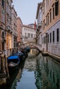 Venice canal, gondolas and traditional Venetian houses view Royalty Free Stock Photo