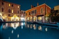 Venice, Italy - 1 November, colorful buildings on the old night street Royalty Free Stock Photo