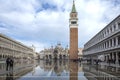 Venice, Italy - November 27, 2018: High water on St. Mark`s Square in Venice. St. Marks Square Piazza San Marco during flood