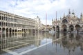 Venice, Italy - November 27, 2018: High water on St. Mark`s Square in Venice. St. Marks Square Piazza San Marco during flood