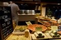 Italian Pizzaria Restaurant window display with vegetable rolls, pasta and pizza in Venice, Italy