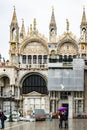 Tourists on a rainy day in Piazza San Marco St Marks Square, Venice, Italy Royalty Free Stock Photo