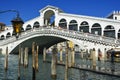 Venice, Italy, October 2021: Crowd of people standing along the famous Rialto Bridge. Royalty Free Stock Photo