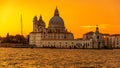 Venice, Italy - OCTOBER 23, 2018, a magnificent sunset over the Grand Canal against the background of the Basilica di Santa Maria Royalty Free Stock Photo