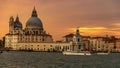 Venice, Italy - OCTOBER 23, 2018, a magnificent sunset over the Grand Canal against the background of the Basilica di Santa Maria Royalty Free Stock Photo