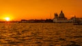 Venice, Italy - OCTOBER 23, 2018, a magnificent sunset over the Grand Canal against the background of the Basilica di Santa Maria Royalty Free Stock Photo