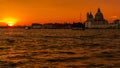 Venice, Italy - OCTOBER 23, 2018, a magnificent sunset over the Grand Canal against the background of the Basilica di Santa Maria Royalty Free Stock Photo
