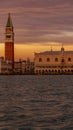 Venice, Italy - October 23, 2018, magnificent sunset over the Grand Canal against the background of the Campanile of St. Mark`s