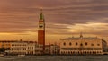 Venice, Italy - October 23, 2018, magnificent sunset over the Grand Canal against the background of the Campanile of St. Mark`s