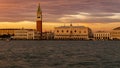 Venice, Italy - October 23, 2018, magnificent sunset over the Grand Canal against the background of the Campanile of St. Mark`s