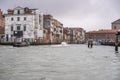 Motorboats entering historical canal, Venice, Italy