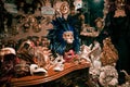 A shop full of traditional masks and souvenirs in a small street