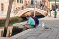 Street life in Venice. People enjoying a nice day