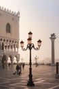 VENICE, ITALY - OCTOBER 06, 2017: Tourits on the San Marco square at sunrise Royalty Free Stock Photo
