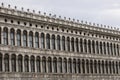 Venice, Italy, 05.26.2022: renaissance facade of Procuratie Vecchie, building on st Marks square, known as piazza. Italian