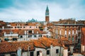 Venice, Italy. Rooftop view, roofs of traditional old houses in Venice. Venezia, overlooking houses roofs and beautiful