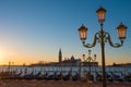 Venice Italy seafront with gondolas and lanterns