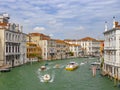 People enjoy visiting the grand canal in Venice