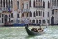 VENICE, ITALY - Sep 23, 2016: typical scene on canale grande, a venetian gondola with gondoliere and asian tourists