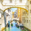 Bridge of Sighs and gondolas traffic in Venice