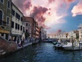 Venice, Italy - September 02, 2018: Dramatic wide angle landscape of Grand canal and Italian colorful houses, View of motor Boat Royalty Free Stock Photo