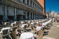 Venice, Italy - September, 9 2018: A Gran Caffe Chioggia outdoor seating open air restaurant at the street at at St