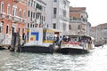 People travel aboard an ACTV public transport water bus in Venice