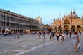 Tourists are on famous Piazza San Marco, Venice, Italy Royalty Free Stock Photo