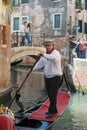 Venetian gondolier close-up on a city canal. Venice, Italy Royalty Free Stock Photo