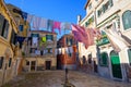 Venice Italy street with laundry washed clothes hanging out to dry Royalty Free Stock Photo