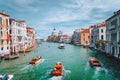 Venice, Italy. Tourist boats in Grand Canal with Basilica Santa Maria della Salute view in background Royalty Free Stock Photo