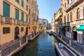 Venice, Italy - 15.08.2019: Traditional gondolas in venetian water canal in Venice. Beautiful turistic place Royalty Free Stock Photo