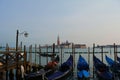 Venice, Italy 02 12 2017: venetian gondolas on grand canal with view of lagoon Royalty Free Stock Photo