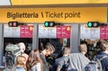 People at a ticket point to buy public transport tickets in Venice, Italy