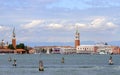 Venice lagoon with bell tower of St. Mark and St. George Royalty Free Stock Photo