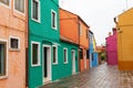 Venice landmark, Burano island canal, colorful houses church and boats, Italy. Royalty Free Stock Photo