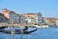 Venice landscape with moored gondolas and St. Mary of the Visitation Church