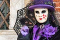 Venice masked lady with umbrella