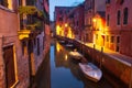 Venice at night. Boats in canal street houses in water. Venice cityscape, Italy Royalty Free Stock Photo