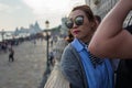 Venice - October 04: Unknown Asian tourists make a selfie in front of the famous Ponte dei Sospiri bridge on October 04