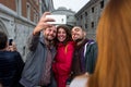 Venice - October 04: Unknown tourists make a selfie in front of the famous Ponte dei Sospiri bridge on October 04, 2017