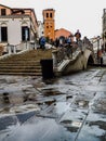 Venice. photos taken during a rainy day near the train station. images colored by the color of the wet walls that accentuate the
