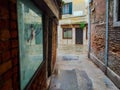 Venice. photos taken during a rainy day near the train station. images colored by the color of the wet walls that accentuate the