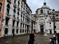 Venice. photos taken during a rainy day near the train station. images colored by the color of the wet walls that accentuate the