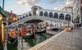 Venice. the Rialto Bridge at dusk and the traditional gondolas Royalty Free Stock Photo