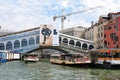 Venice. Rialto Bridge, waterbus stop and vaporetto in Grand Cana